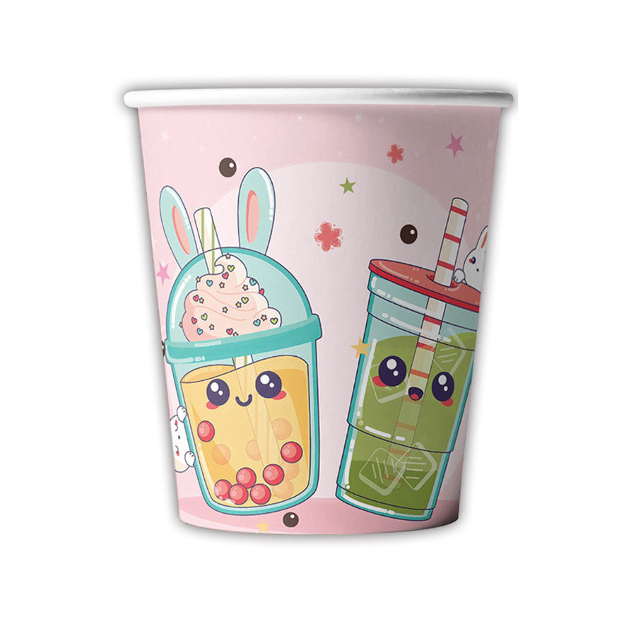 Paper cup with cartoon bubble tea design on a pink background