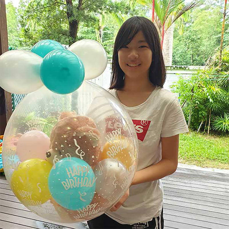 Girl grad receiving her congratulatory gift delivered at her door.