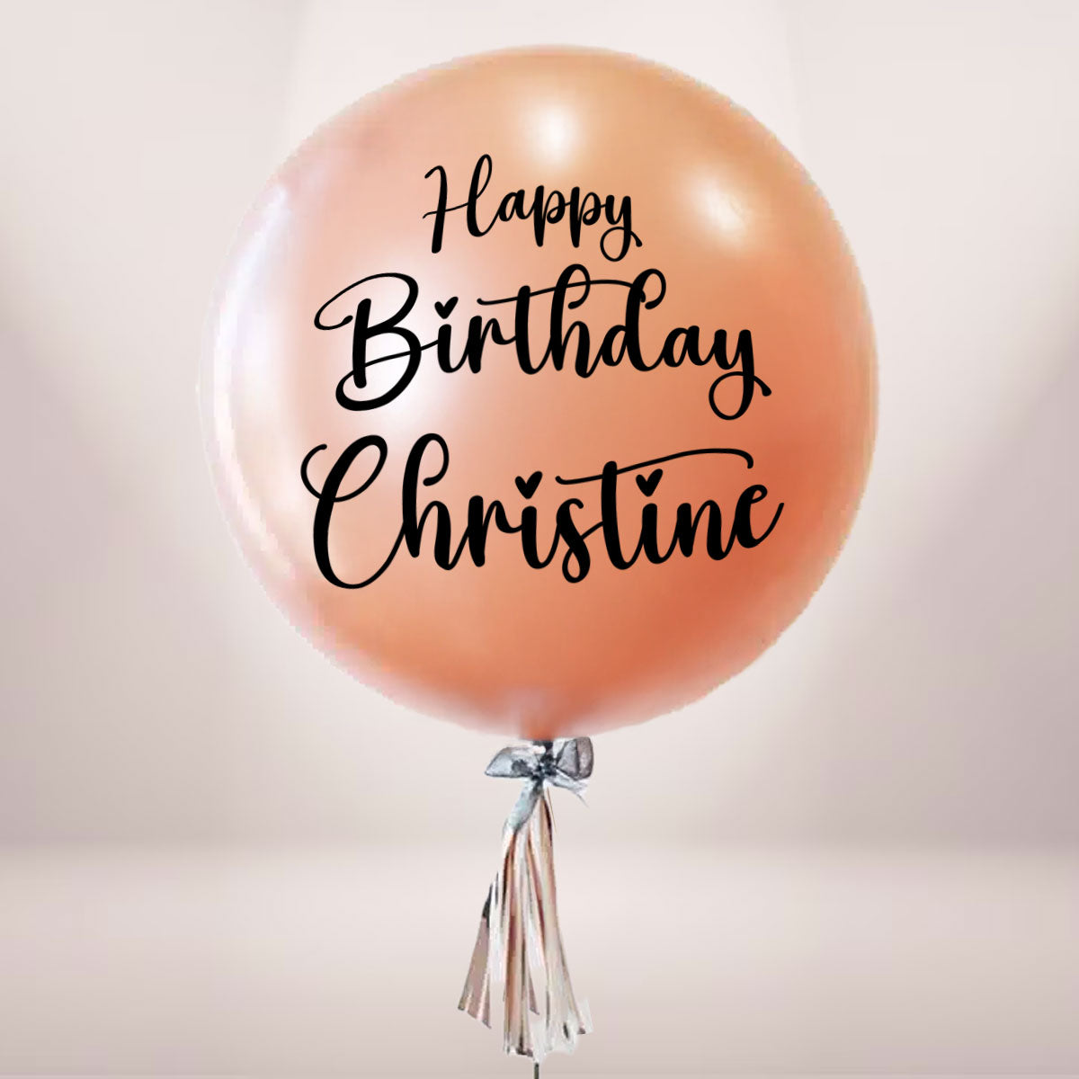 Rose gold balloon customised with a special message for the birthday star!