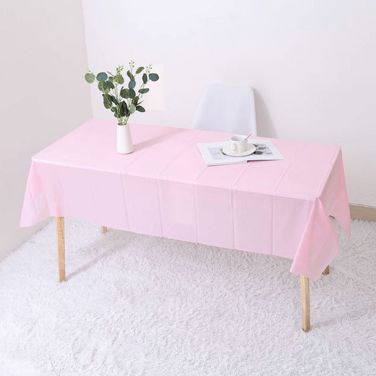 Macaron Pink Plastic Table Cover for your dessert table set up.