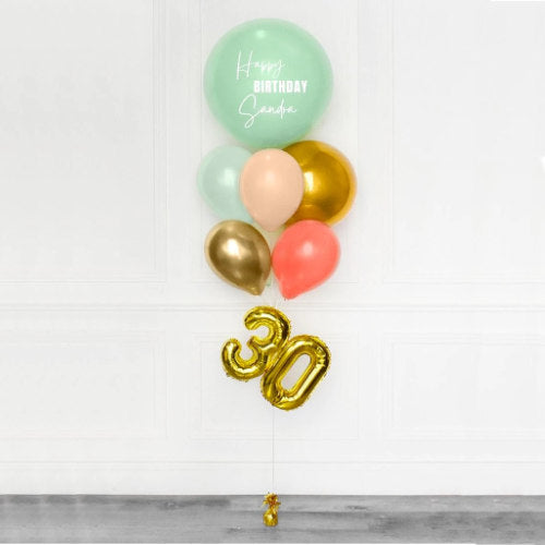 Mint Green Customised Jumbo Latex Balloon with gold numbers.