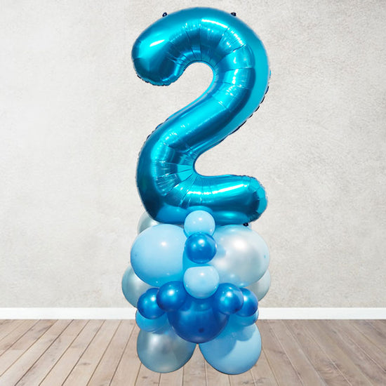 Blue coloured balloon column for the boy's birthday party decoration.