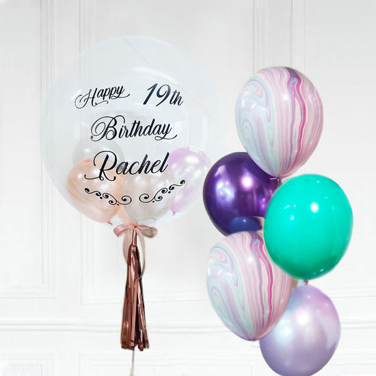 Stylish and lively coloured balloon matched with a customised bubble balloon in matching colours.