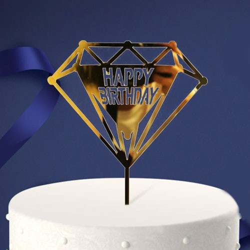 Gold reflective acrylic cake topper for a simple yet classy birthday cake decoration.