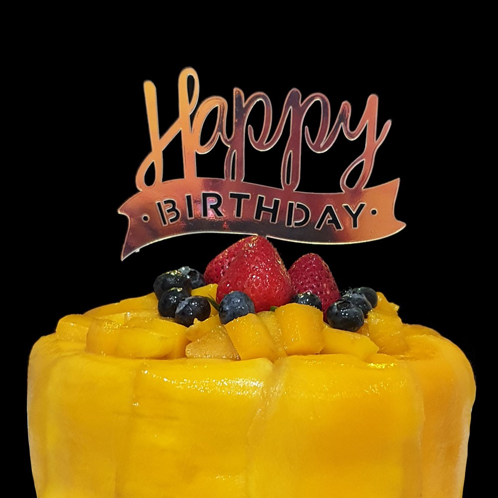 Iridescent acrylic cake topper with illuminating effect for a stylish and classy birthday cake decoration.