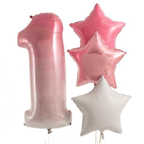 Ombre Pink Number 1 Balloon Bouquets to celebrate the little girl's first birthday!