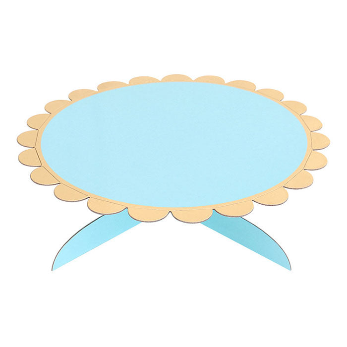Blue cake stand with gold trimming.