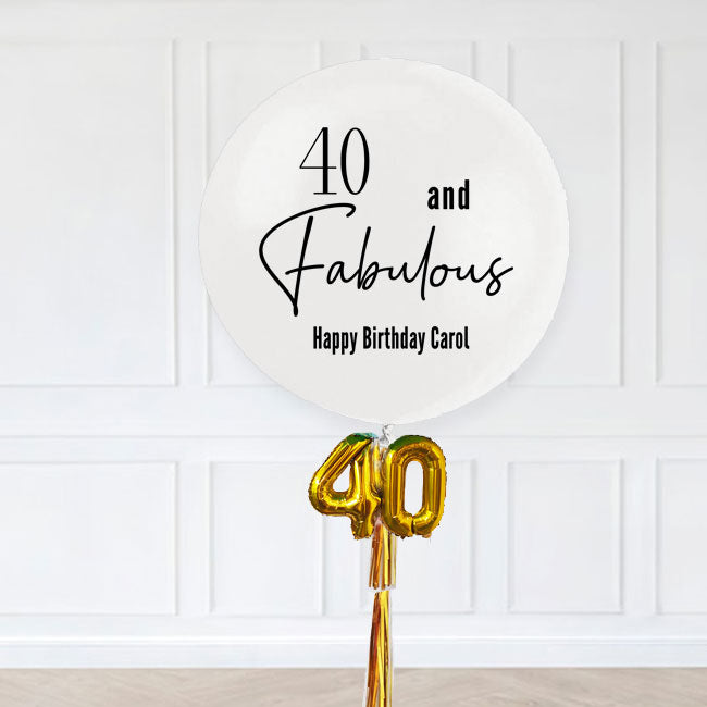 Lovely jumbo balloon with air filled number display at the bottom, coupled with 2 tassels.