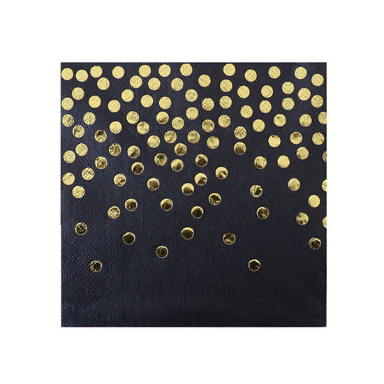 Gold stamping polkadots on black napkins.