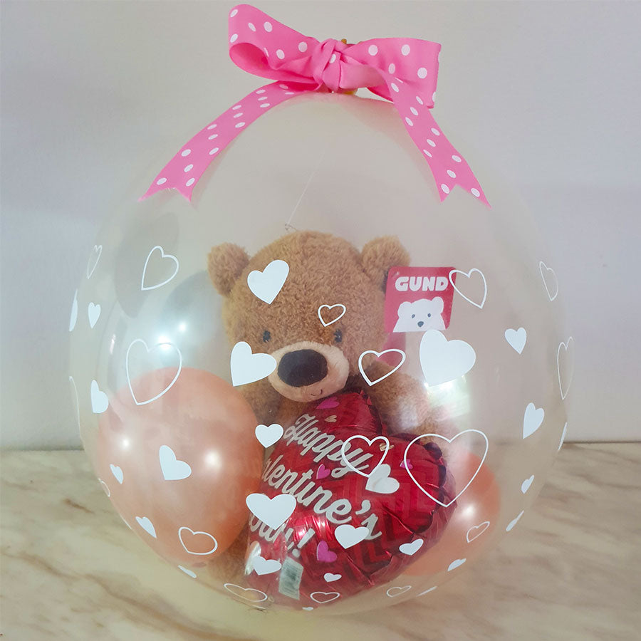 Send a heartfelt Valentine's Day message of love to your sweetheart with a lovely 13.5" Gund Fuzzy Beige Bear stuffed in a balloon.