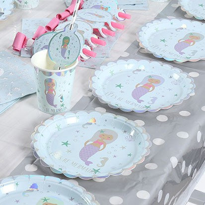 Silver coloured Little Mermaid Princess themed party supplies set up for the birthday party!