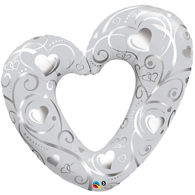A 42 inch round pearl white balloon with a hearts and filigree pattern.