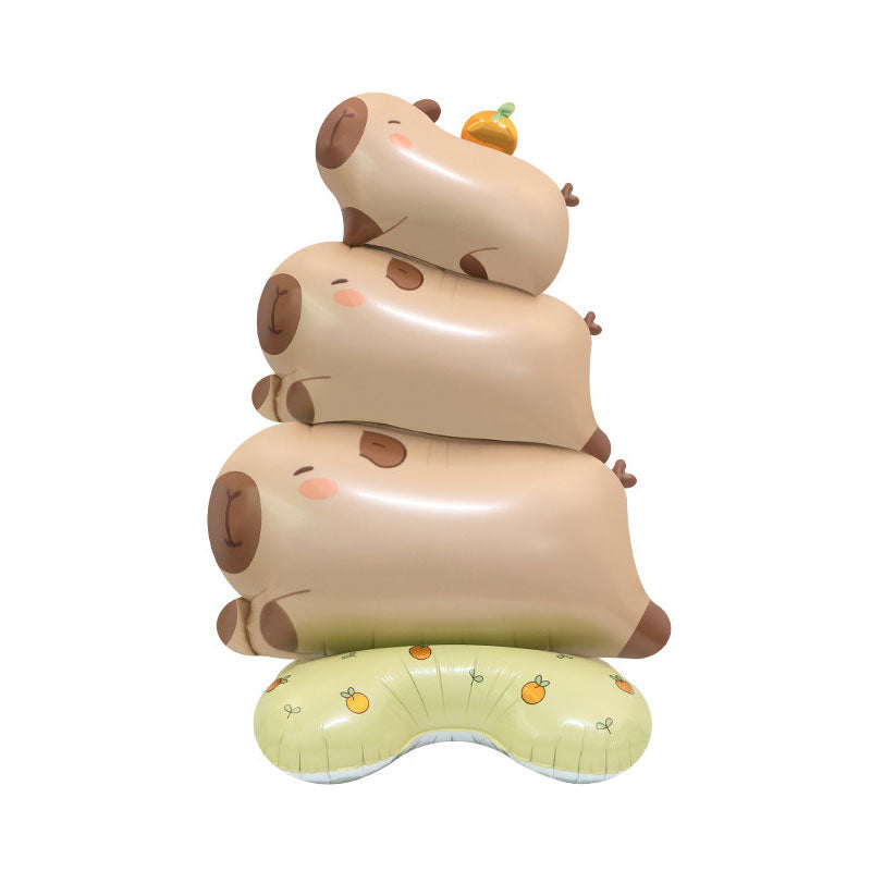 A stack of capybara balloon standing as a party centerpiece.