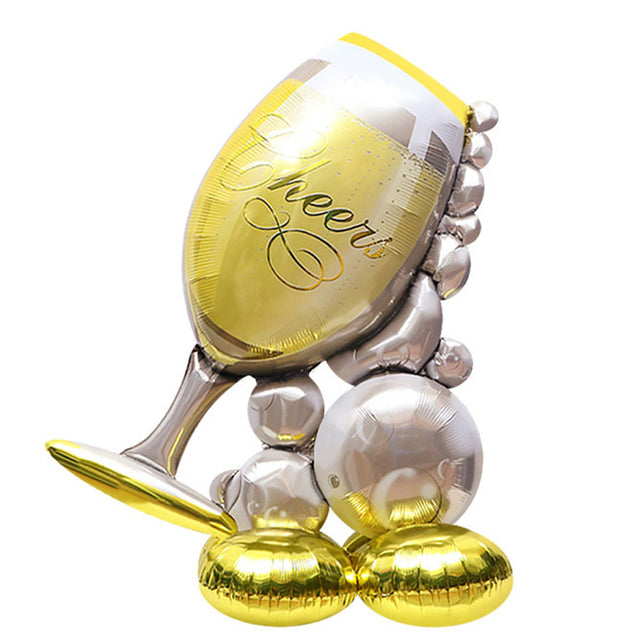 Decorative balloon shaped like a champagne glass with 'Cheers'printed on it.
