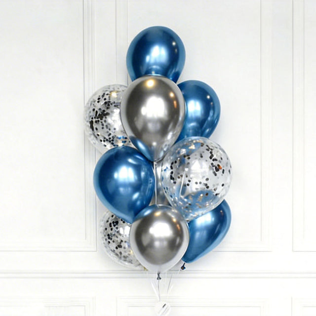 Balloon bouquet with blue, silver, and clear balloons on a white background