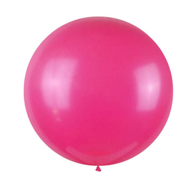 Single pink balloon on a white background