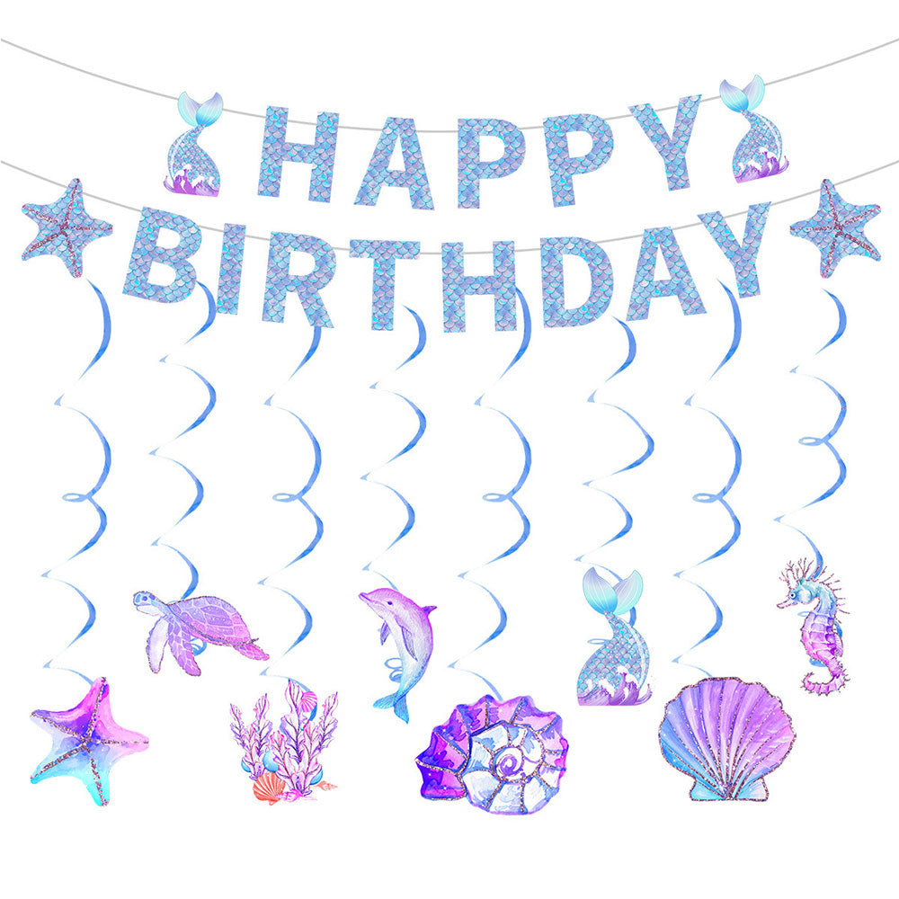 Mermaid-themed birthday party decoration set featuring a 'HAPPY BIRTHDAY' banner, hanging blue spiral streamers, and sea-themed ornaments including a mermaid tail, starfish, turtle, dolphin, seahorse, shell, and coral in purple, blue, and pink on a white background.