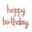 Rose gold 'happy birthday' balloon banner on a white background
