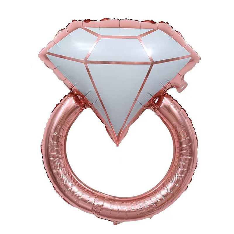 Jumbo large shaped balloon in the design of a rose gold wedding ring. Great for wedding or proposal.