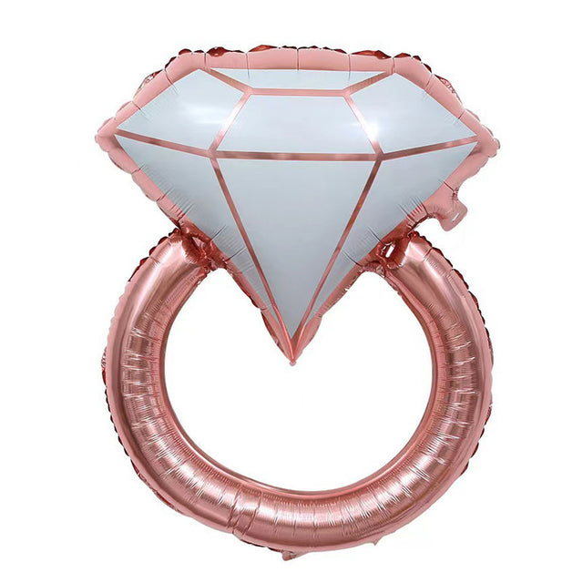 Jumbo large shaped balloon in the design of a rose gold wedding ring. Great for wedding or proposal.