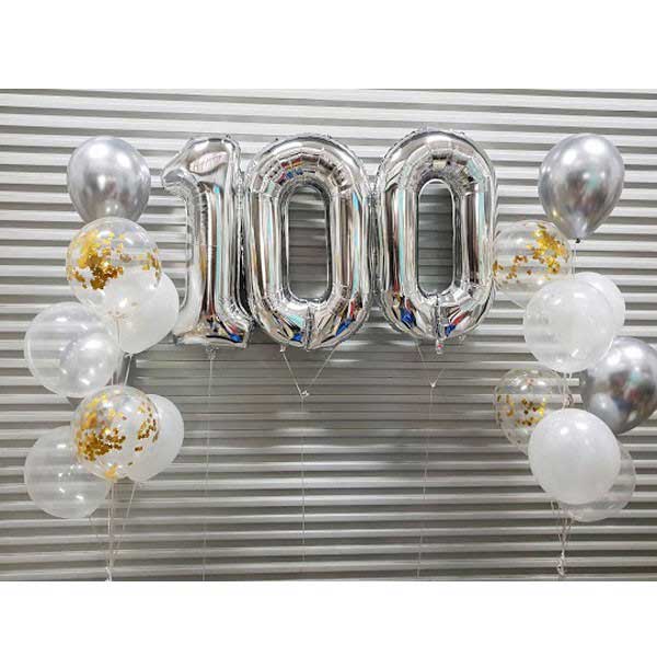 Day 100 to be celebrated with a distinct jumbo silver number balloons matched up with some silver chrome and gold confetti balloon bouquets. Epic!