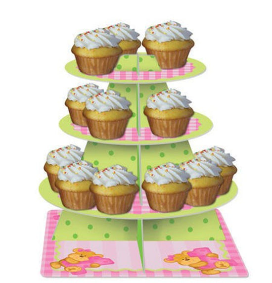 Load image into Gallery viewer, 1st Birthday Bear Girl Cupcake Stand - Complete a first birthday party ensemble with the Bear’s First Birthday Tiered Server! The three tiered server features a blue base with brown bears hugging a big pink number “1”. A green polka dot display extends up1st Birthday Bear Girl Cupcake Stand - Complete a first birthday party ensemble with the Bear’s First Birthday Tiered Server! The three tiered server features a blue base with brown bears hugging a big pink number “1”. A green polka dot display extends up
