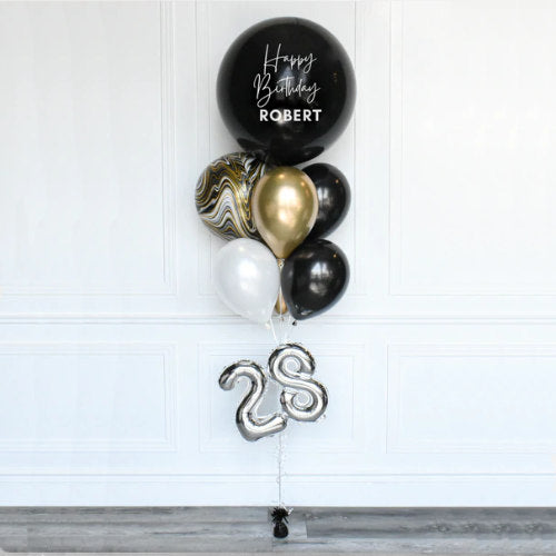 Black Customised Jumbo Latex Balloon with silver numbers.