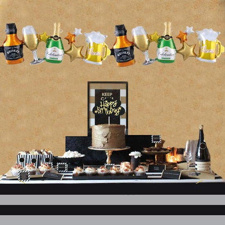 Champagne bottles and beer glasses hanging on the balloon garland for a fabulous party decoration.