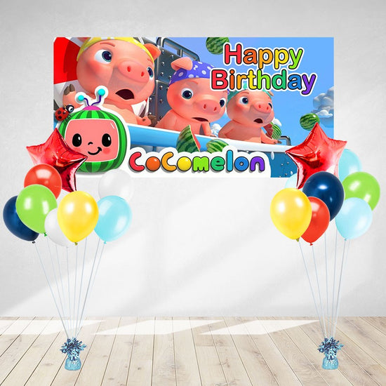 Banner and Balloon decoratons in Cocomelon theme, featuring the 3 little pigs.