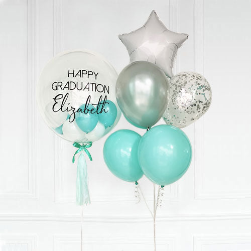 Cool and striking tiffany blue balloon matched with silver and white balloons.