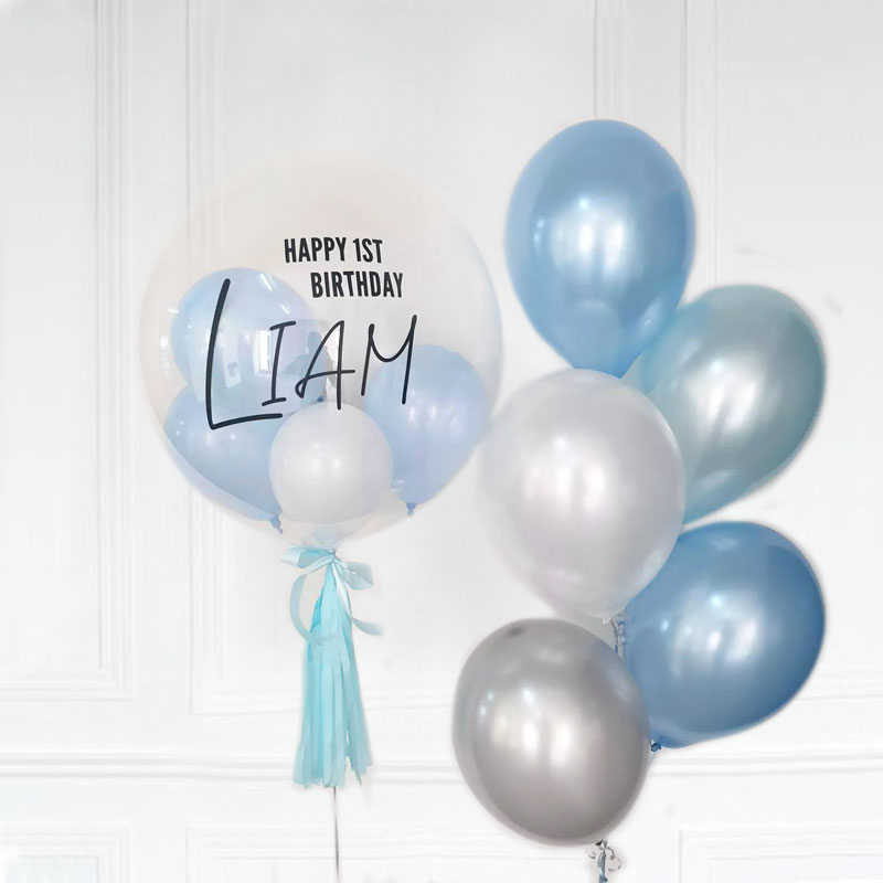 Lovely soft Light Blue and Azure balloons with a customised 1st birthday bubble balloon