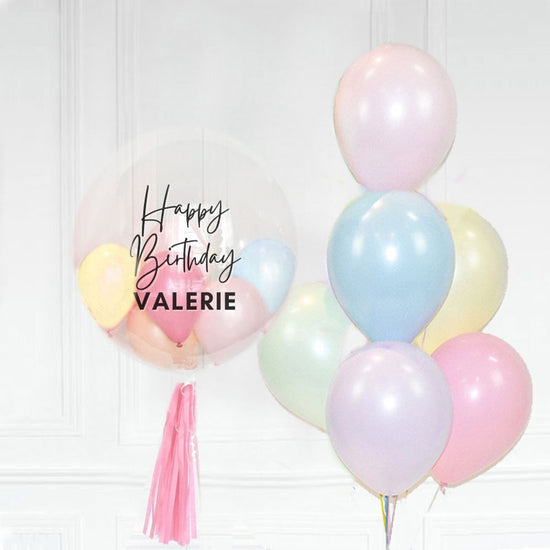 Customised Bubble Balloon with light macaron coloured balloons.