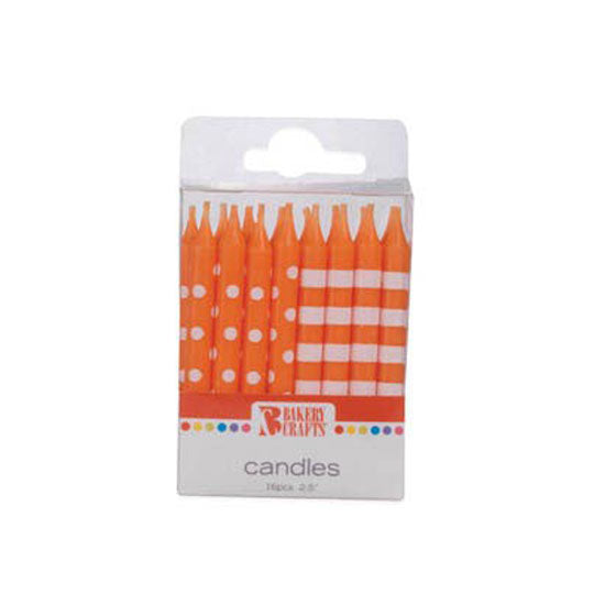 Orange candles with dots and stripes.