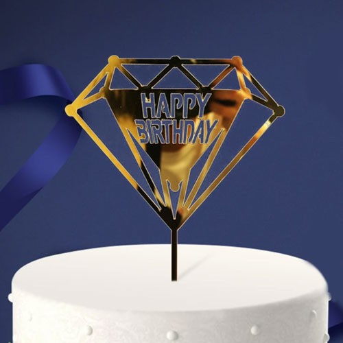 Gold reflective acrylic cake topper for a simple yet classy birthday cake decoration. 