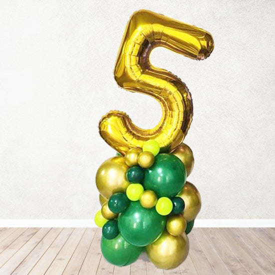 Green and Gold themed Number Balloon Column for the jungle theme birthday party.