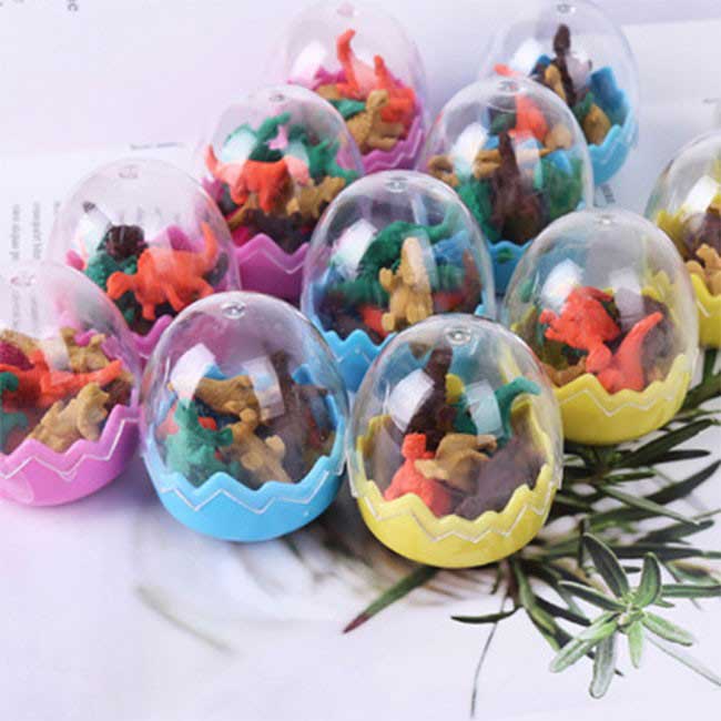 Load image into Gallery viewer, Mini Dinosaur Erasers packed in a dino egg for little kids as party favors. 
