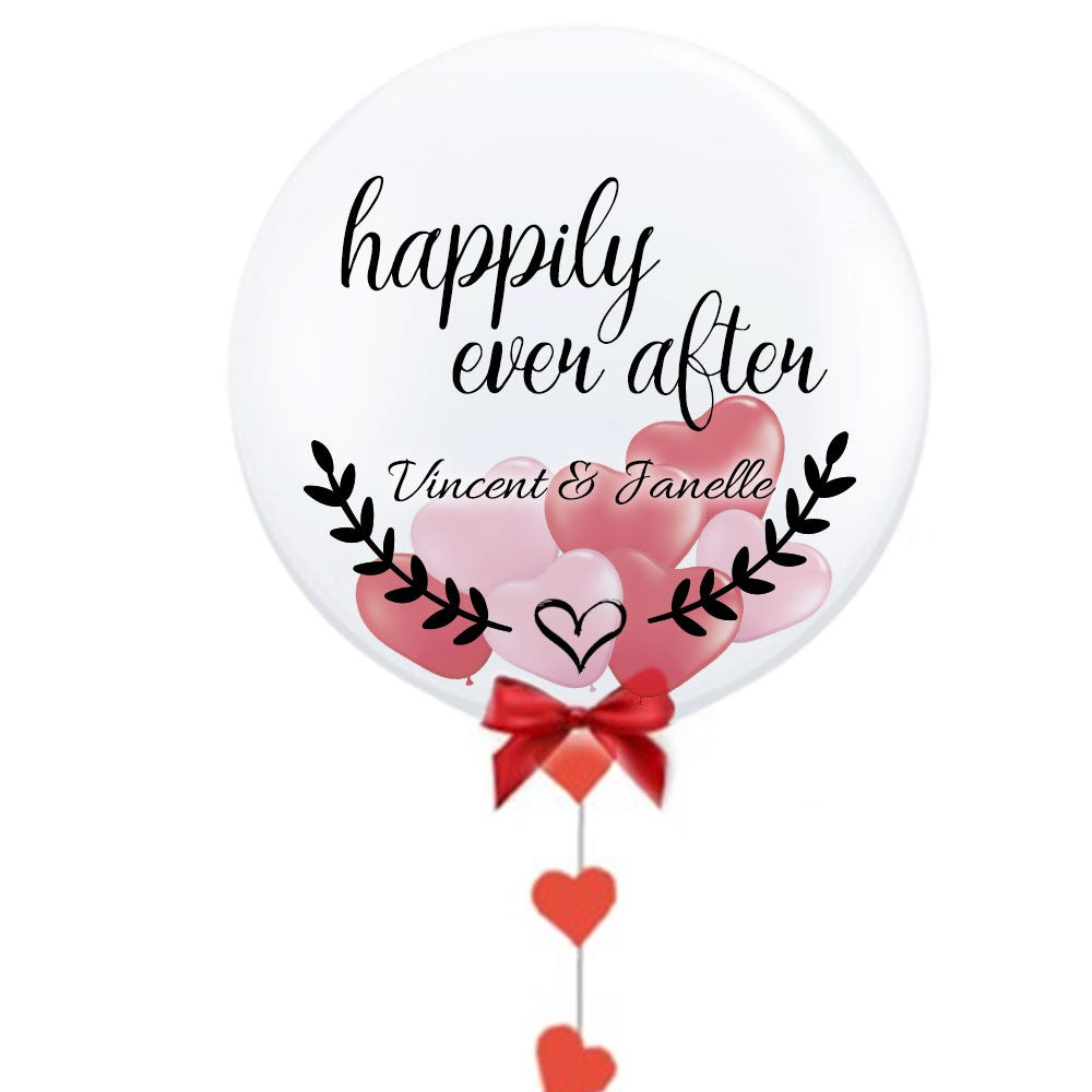 Load image into Gallery viewer, Customised bubble balloon to celebrate the communion of a lovely newly wed couple.
