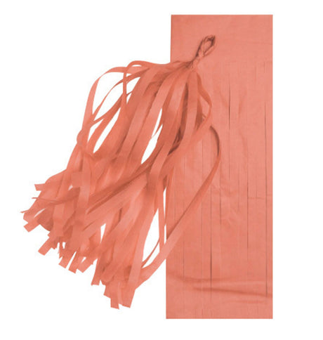 Salmon coloured papaer tassels.