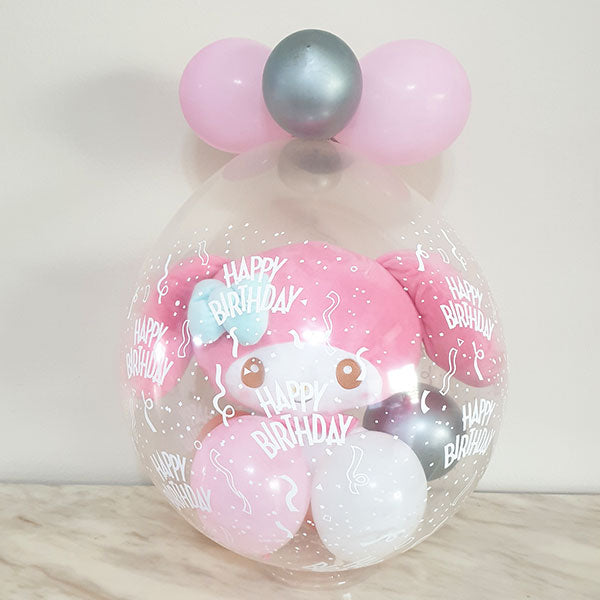 Adorable My Melody soft toy being wrapped in a Happy Birthday Balloon for a special gift.
