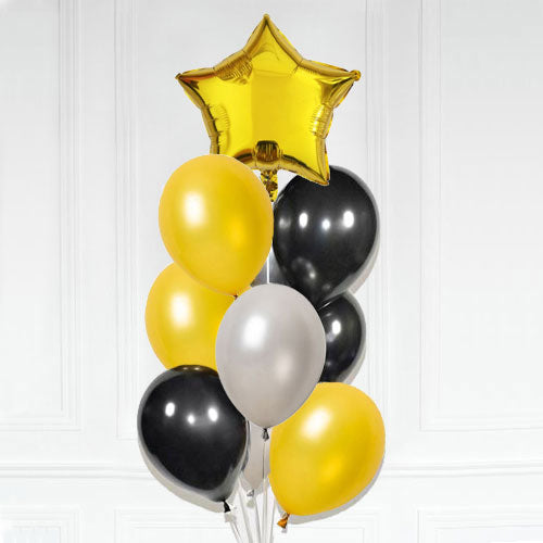 Gold and Black balloons are now in trend. Bunch them into a balloon bouquet.