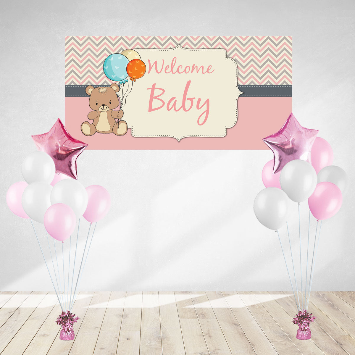 Pink banner and balloons set for decorating the party to celebrate the arrival of the sweet baby girl.