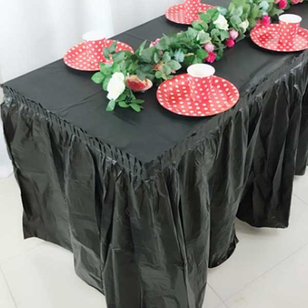 Black table skirting for a marvellous black and gold 21st birthday party celebration/