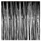 Black foil backdrop for birthday decoration.