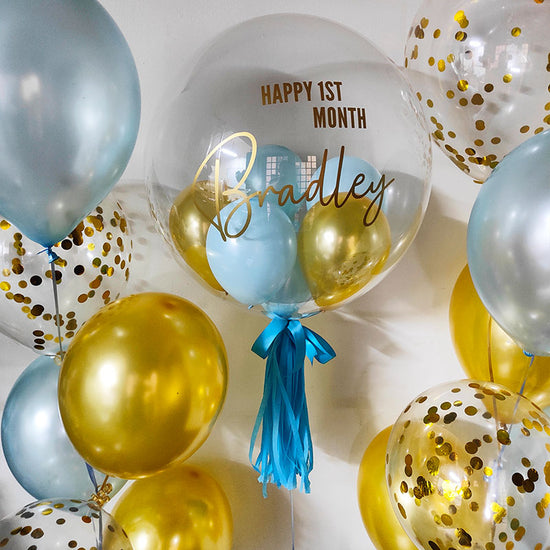 Load image into Gallery viewer, Celebrating a First Month Newborn Baby with a customised bubble balloon.
