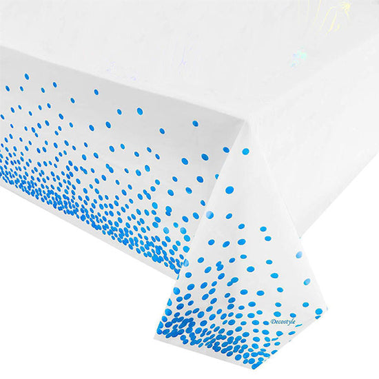 Blue polkadots over the white table cover for an enhanced youthful look for your birthday cake table or dessert table.  