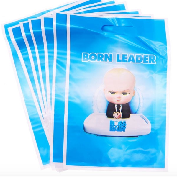 Party favours packed into the Boss Baby treat bags with the names of the little guests written on them.