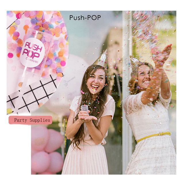 Girls having fun with party Confetti Push Pop.