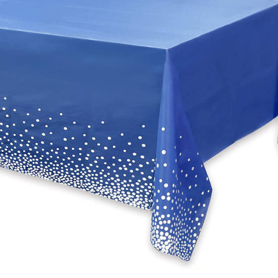 Stylish blue table cover with glittering silver dots is so cool for our birthday party cake table.