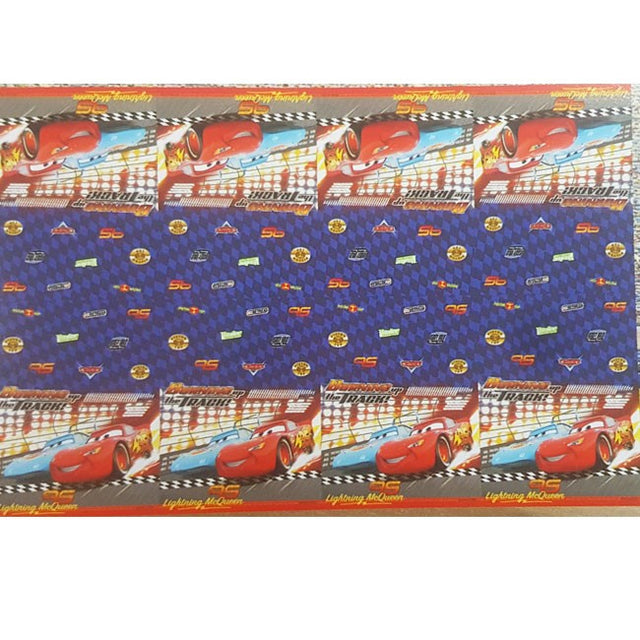 I liked how the colourful pictures of the Disney Cars characters display themselves in front of the cake table. The cake cutting photos are so beautiful.