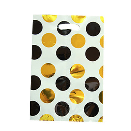 Large polka dots with black and gold foil treat bags to pack these lovely little gifts.